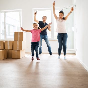 Couple Bying Home And Moving Into New House